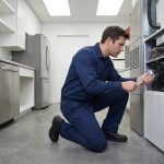 HVAC technician servicing a home heating and cooling system